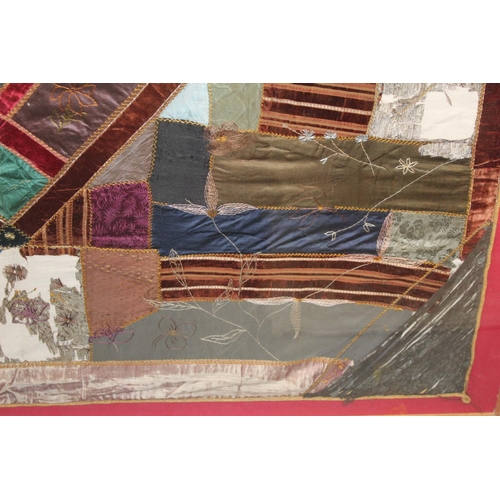 428 - A Victorian 'crazy' pattern patchwork quilt or panel with central diamond lozenge, in polychrome cot... 