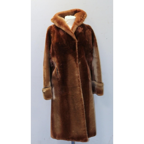 438 - Vintage sheepskin coat, chestnut brown, retailed by Arnison's of Penrith.