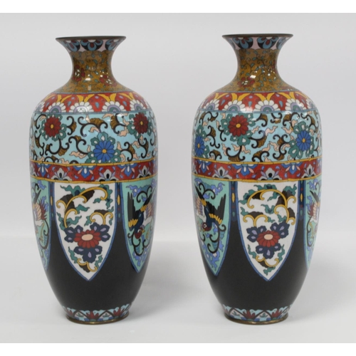 337 - Pair of Oriental cloisonné vases of ovoid baluster form with polychrome panels and borders of phoeni... 