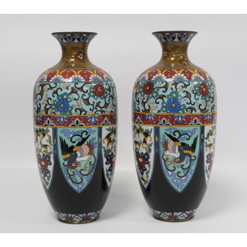 337 - Pair of Oriental cloisonné vases of ovoid baluster form with polychrome panels and borders of phoeni... 