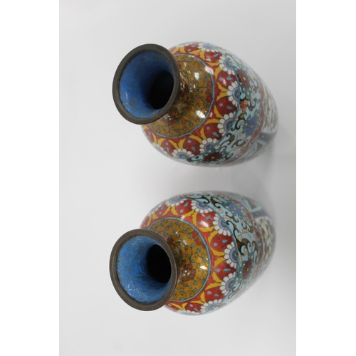 337 - Pair of Oriental cloisonné vases of ovoid baluster form with polychrome panels and borders of phoeni... 