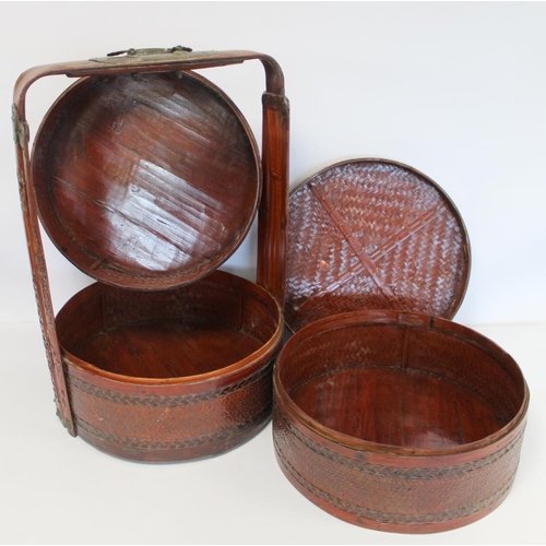 341 - Late 19th/early 20th century Chinese bamboo and cane three tiered wedding basket with red brown lacq... 