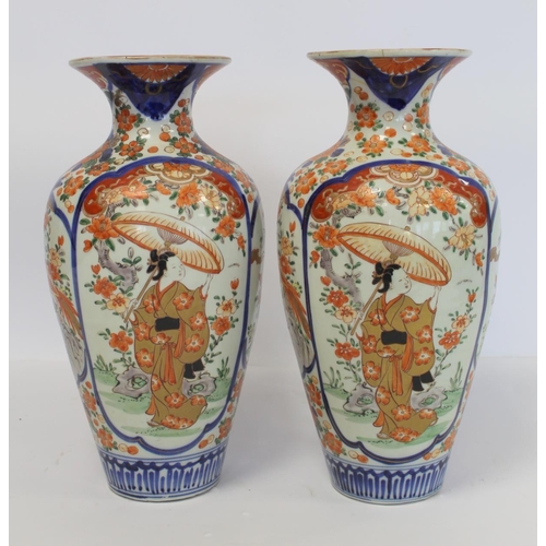 343 - Pair of late 19th/early 20th century large Japanese Imari vases of baluster form decorated with pane... 