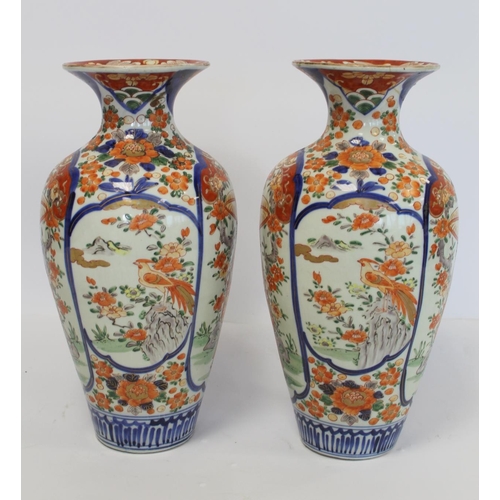 343 - Pair of late 19th/early 20th century large Japanese Imari vases of baluster form decorated with pane... 