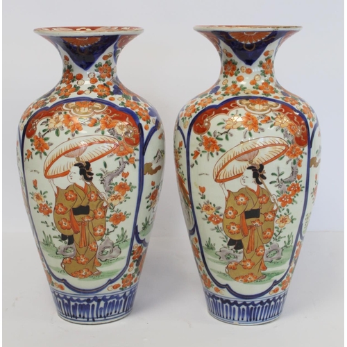 343 - Pair of late 19th/early 20th century large Japanese Imari vases of baluster form decorated with pane... 