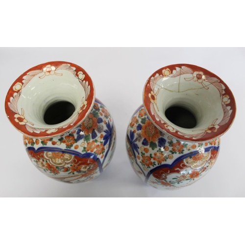 343 - Pair of late 19th/early 20th century large Japanese Imari vases of baluster form decorated with pane... 