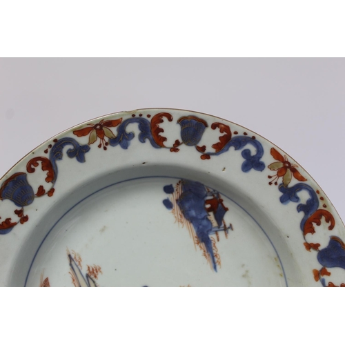 347 - Three 18th century Chinese porcelain soup plates decorated with pagodas in a landscape in underglaze... 