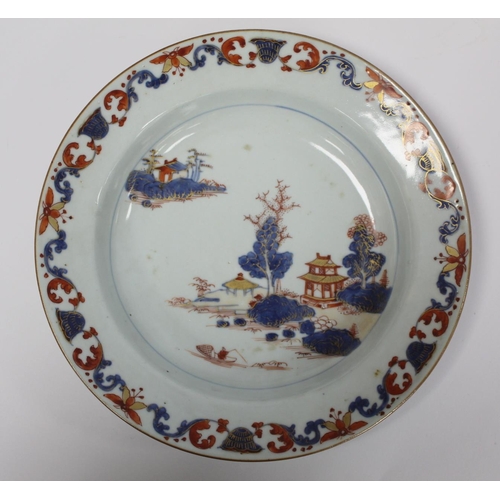 347 - Three 18th century Chinese porcelain soup plates decorated with pagodas in a landscape in underglaze... 