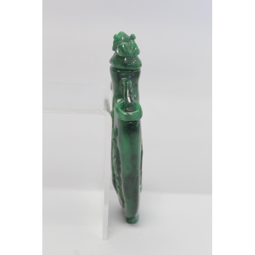 354 - 20th century Chinese dark green mottled jade snuff bottle of flat baluster form with twin ring handl... 