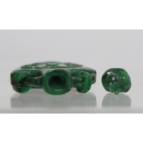 354 - 20th century Chinese dark green mottled jade snuff bottle of flat baluster form with twin ring handl... 