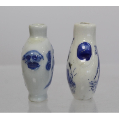 358 - Chinese underglaze blue and white porcelain snuff bottle depicting a peddler and scholar and another... 