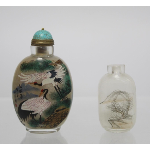 359 - Large 20th century Chinese glass snuff bottle with internal painted decoration of cranes, pine trees... 