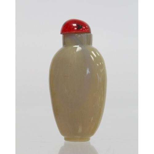 360 - 20th century Chinese small café au lait agate snuff bottle of ovoid form with relief carving of a sa... 