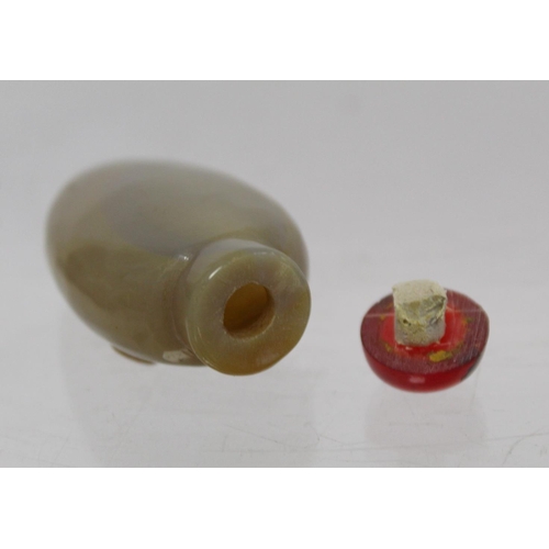 360 - 20th century Chinese small café au lait agate snuff bottle of ovoid form with relief carving of a sa... 