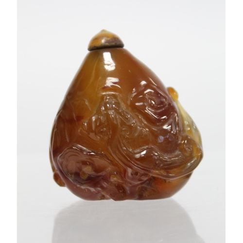 361 - 20th century Chinese dark yellow agate snuff bottle of pear form carved with Chilong with similarly ... 