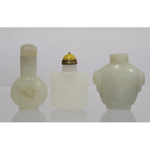 367 - Three Chinese white soapstone snuff bottles: one with twin mask head handles, lacking stopper, 6cm h... 