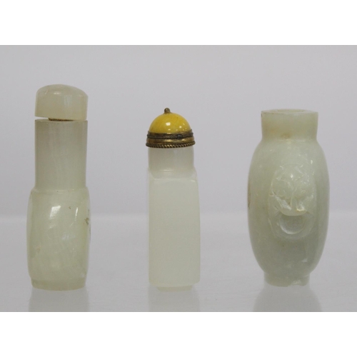 367 - Three Chinese white soapstone snuff bottles: one with twin mask head handles, lacking stopper, 6cm h... 