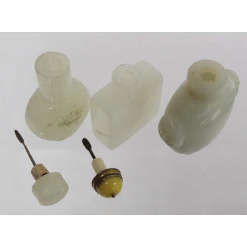 367 - Three Chinese white soapstone snuff bottles: one with twin mask head handles, lacking stopper, 6cm h... 