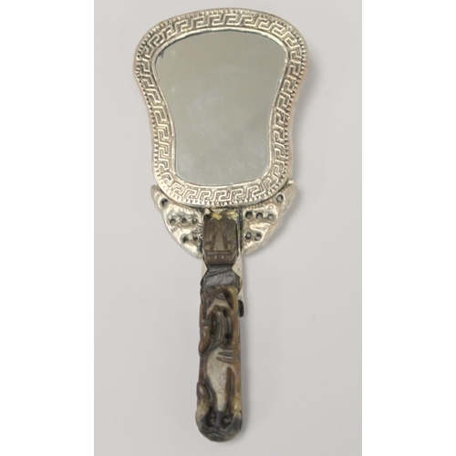 370 - Chinese lady's hand mirror, the plated repoussé back with scrolling dragon and two oval caboc... 