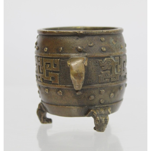 374 - Chinese miniature barrel shaped vessel of censor with twin elephant mask handles and tripod feet, ar... 