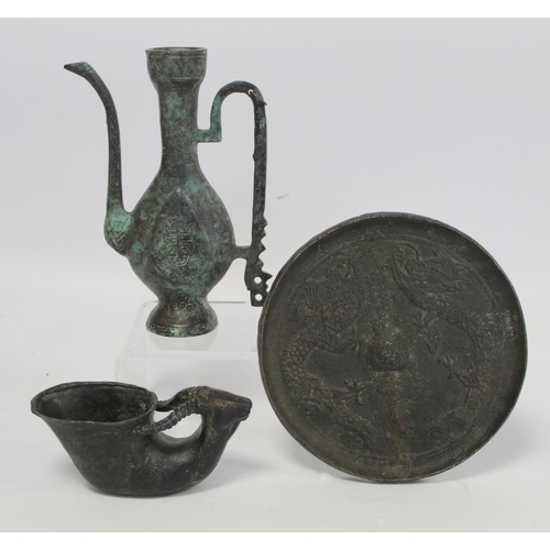 375 - Small Chinese bronze wine ewer with incised decoration and verdigris patina, 18cm high; a circular b... 