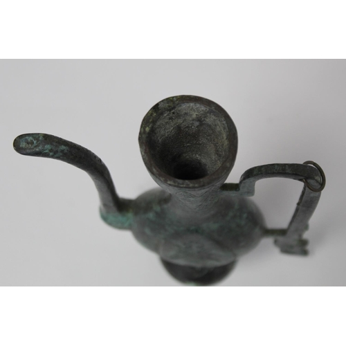 375 - Small Chinese bronze wine ewer with incised decoration and verdigris patina, 18cm high; a circular b... 