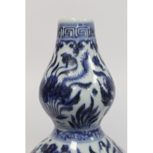 378 - Antique Chinese Ming style blue and white porcelain vase of double gourd form with underglaze blue f... 