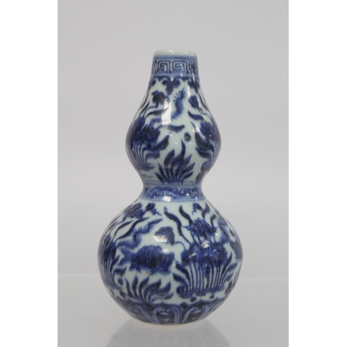 378 - Antique Chinese Ming style blue and white porcelain vase of double gourd form with underglaze blue f... 