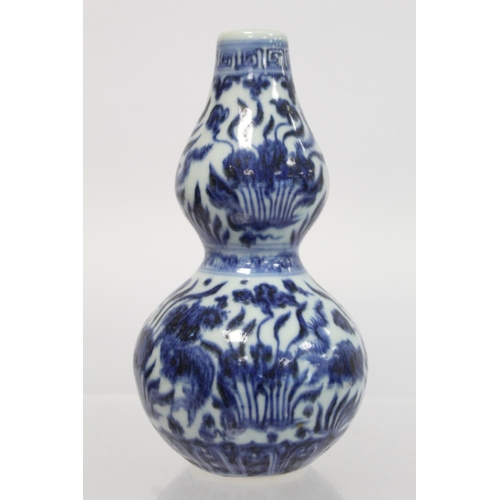 378 - Antique Chinese Ming style blue and white porcelain vase of double gourd form with underglaze blue f... 