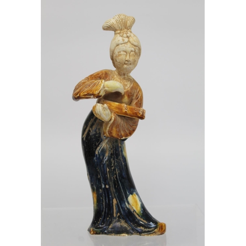 379 - Chinese Sancai glazed figure of a Tang dynasty female musician holding a guqin, the head and ne... 