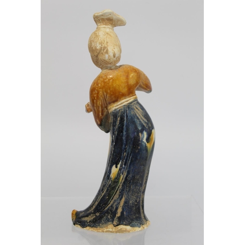 379 - Chinese Sancai glazed figure of a Tang dynasty female musician holding a guqin, the head and ne... 