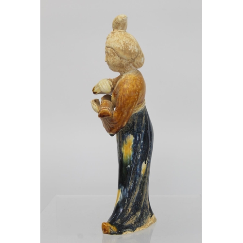 379 - Chinese Sancai glazed figure of a Tang dynasty female musician holding a guqin, the head and ne... 