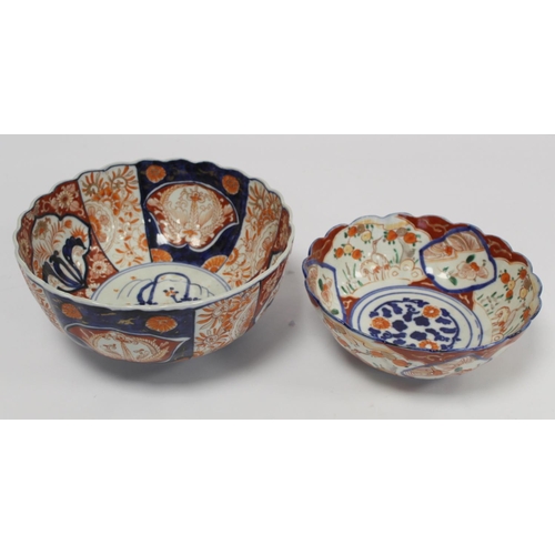 387 - Japanese Meiji period Imari bowl of circular fluted form with circular panel of a vase of flowers su... 