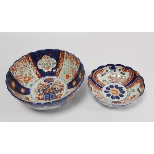 388 - Japanese Meiji period Imari bowl of circular fluted form with central vase of flowers surrounded by ... 