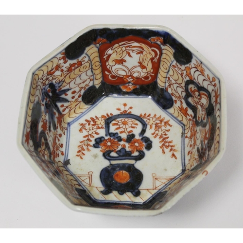 389 - Four pieces of Japanese Imari porcelain, comprising: a small octagonal bowl, 14cm diam.; a covered j... 