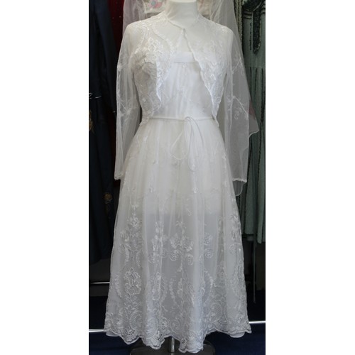 448 - Collection of vintage lady's clothing comprising of French lace short and strapless wedding dress, w... 