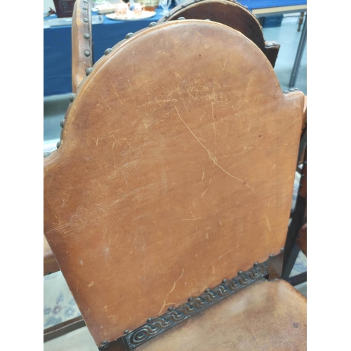 490 - Set of six Jacobean revival oak dining chairs, upholstered in later studded hide, on baluster suppor... 