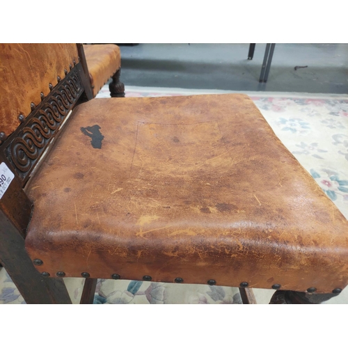 490 - Set of six Jacobean revival oak dining chairs, upholstered in later studded hide, on baluster suppor... 