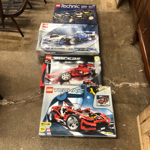 Four boxed Lego Tecnic model kits; 8880; 8386; 8448 & 8461