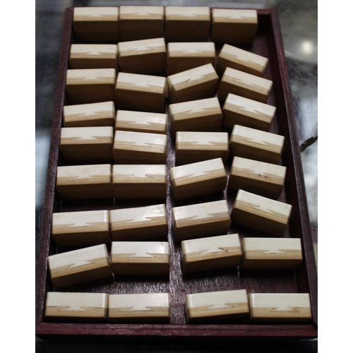 216 - 19th or early 20th century Chinese Mahjong set in wooden case, with 148 bone and bamboo tiles; also ... 