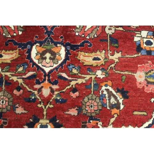 455 - Persian Bahktiari rug, the hand knotted rug with central floral medallion within all over floral mot... 