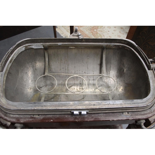 491 - Catering meat serving/carving trolley, circa 1920s, with a revolving silver plated domes cloche cove... 