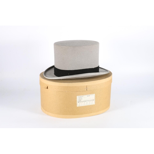 90 - William Anderson and Sons Ltd of Edinburgh, size 7 grey top hat, with black band, in cardboard box.