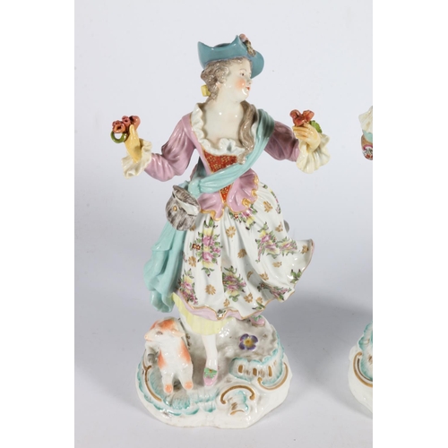 9 - Pair of English porcelain figures modelled as a gentleman with dog at his feet and a lady with lamb,... 