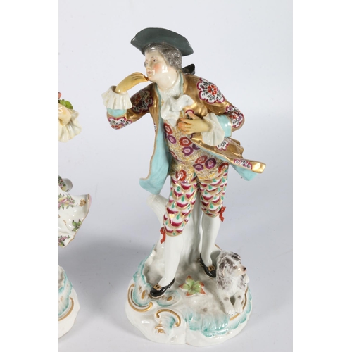 9 - Pair of English porcelain figures modelled as a gentleman with dog at his feet and a lady with lamb,... 