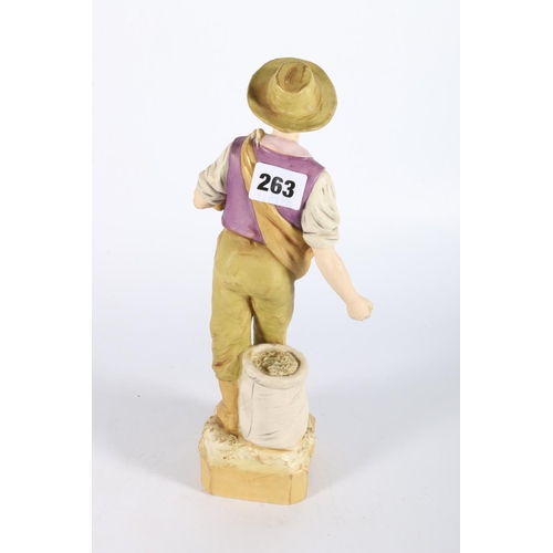 20 - Royal Dux pottery figurine modelled as a farmer sowing seed, 31cm tall.