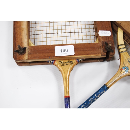 243 - Cameo badminton racquet and a Champion badminton racquet, both with stretchers.  (2)