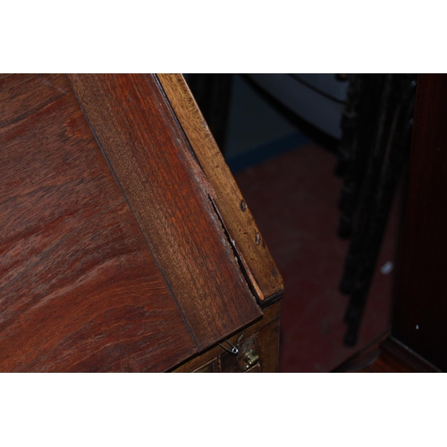 444 - Composite mahogany bureau bookcase, 214cm high, 97cm wide and 52cm deep, old label to the reverse of... 