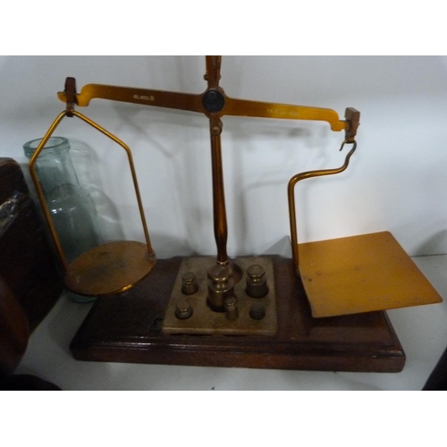 103 - Brass pump, wooden box, shoe lasts, John Dewar whisky glass etc (one shelf).