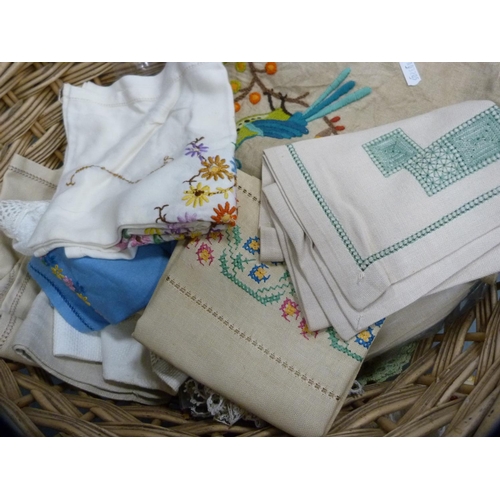 11 - Wicker laundry basket containing napery and linen.